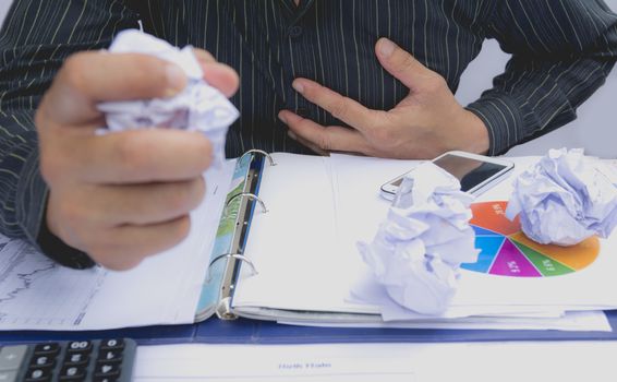 businessman having chest pain and heart attack, hand holding the painful. businessman having heart attack.