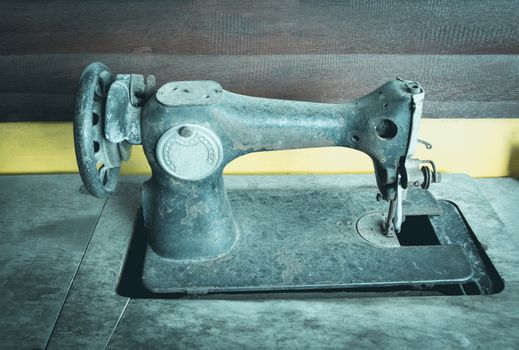 Old vintage hand sewing machine. Closeup the sewing machine, old sewing machine.