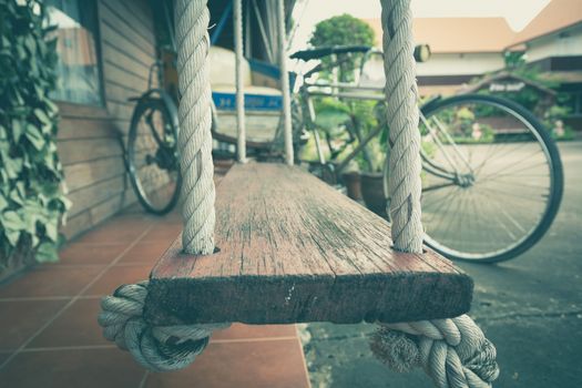 Empty chain swing in playground. Image of children swing.