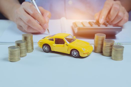 Car insurance with stack coins and car services concept. Business concept. Car insurance concept.
