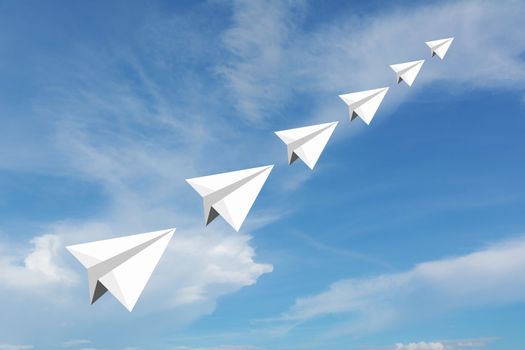 Paper airplane as a leader among another airplane , leadership, teamwork on blue sky background.