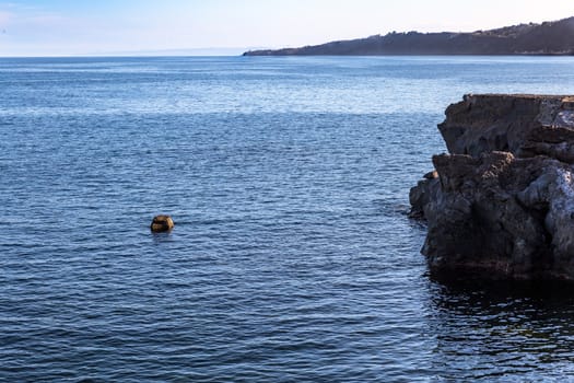 The rocks and the blue Mediterranean sea