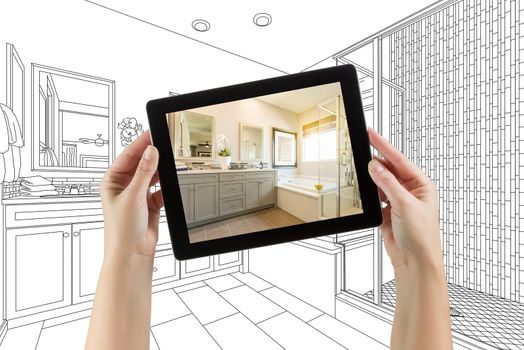 Hands Holding Computer Tablet with Master Bathroom Photo on Screen and Drawing Behind.
