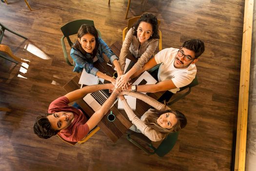 Group of friends studying together for finals