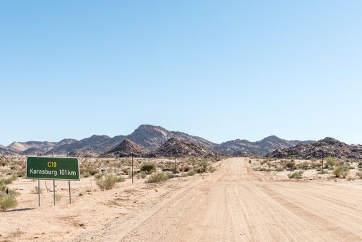 Distance sign on the C10-road between Velloorsdrif  border post and Karasburg in the southern part of Namibia