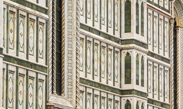 Detail of the external wall of the Duomo of Florence. Outdoor shot. Nobody