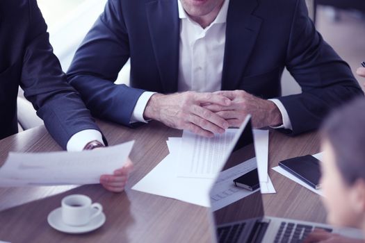 Close-up of Business people working together at meeting