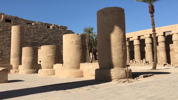 Buildings and columns of ancient Egyptian megaliths. Ancient ruins of Egyptian buildings