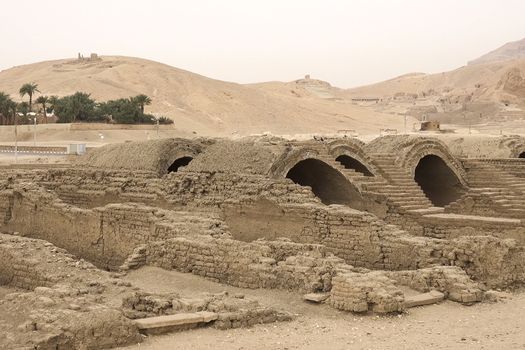 Buildings and columns of ancient Egyptian megaliths. Ancient ruins of Egyptian buildings