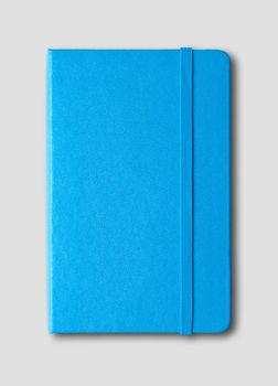 blue closed notebook mockup isolated on grey