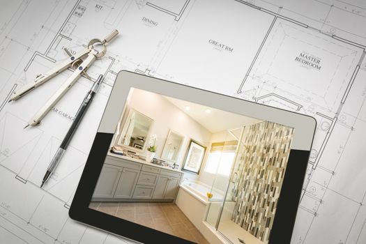 Computer Tablet with Master Bathroom Design Over House Plans, Pencil and Compass.