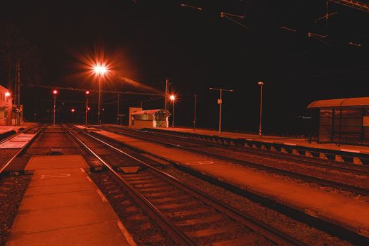 Railway station at the night. European railway station