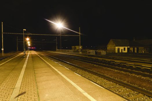 Railway station at the night. European railway station