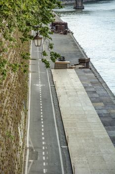 cycle path built on the quay of the Tiber river in Rome