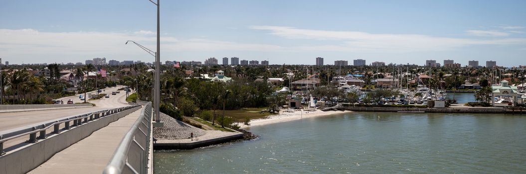 Panoramic view headed onto Marco Island, Florida from Collier Boulevard 951 with the bay ocean view.