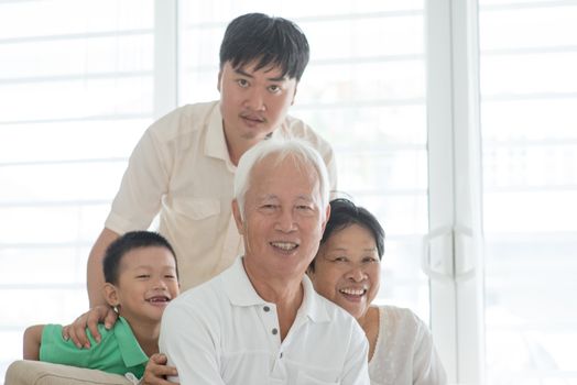 Happy Asian family at home, portrait of multi generations people indoor lifestyle.