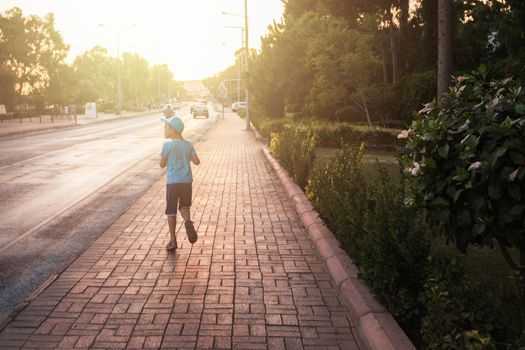 Kid boy walking at Alania city, Turkey