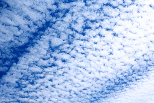 Nice natural background with white clouds against blue sky