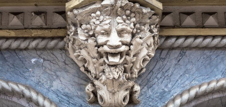 Italy, Turin. This city is famous to be a corner of two global magical triangles. This is a protective mask of stone on the top of a luxury palace entrance, dated around 1800