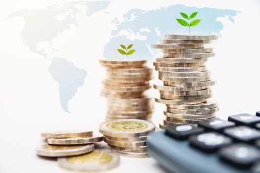 Stock financial indices with stack coin and calculator. Financial stock market in accounting market economy analysis.