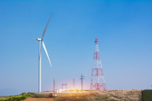 Wind turbines under the blue sky. Wind turbines generating electricity.