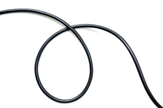 Black wire cable isolated on a white background abstraction.