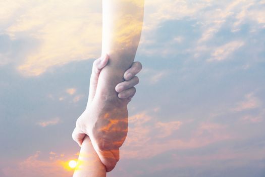 Two pairs of hand touch together, helping hands concept. Helping hand outstretched for help.