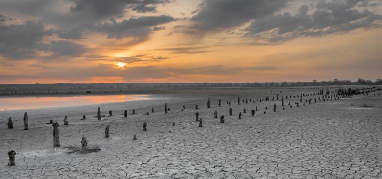 Sunset on the salty estuary Kuyalnik,  dead lake near Odessa, Ukraine