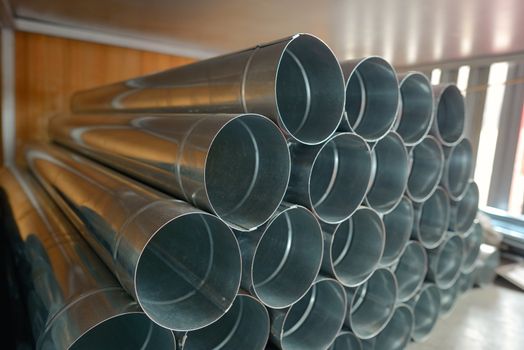 Stack of Galvanized steel Drainpipe in warehouse