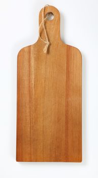 wooden cutting board with handle and string on white background