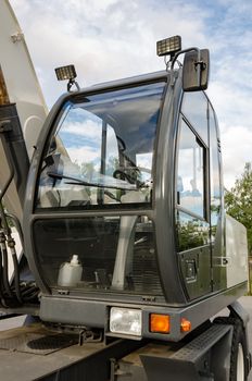 New road-construction equipment outdoors on the exhibition