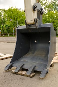 New road-construction equipment outdoors on the exhibition