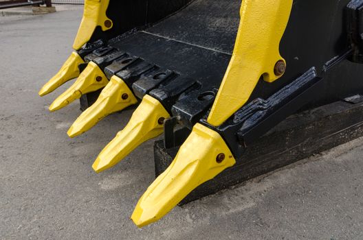 New road-construction equipment outdoors on the exhibition