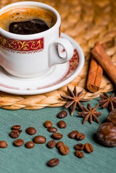 vertical still life on the table Turkish delicious coffee with spices of cinnamon and anise