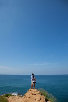 Young couple enjoy beautiful sea view on vacation