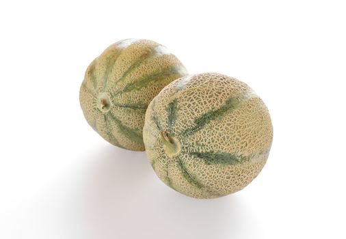 Couple of cantaloupe melon isolated on white background