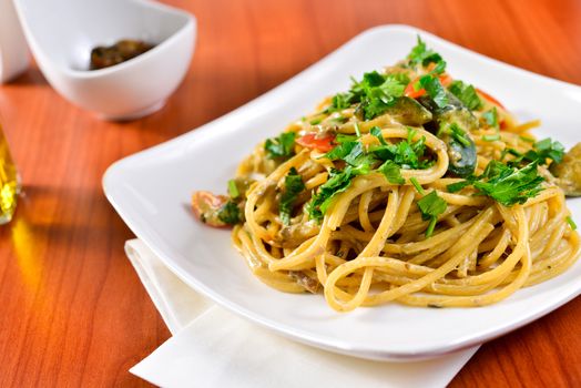 Plate of spaghetti with porcini mushrooms. Italian cuisine, Italian recipes