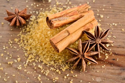 Star anise over the brown sugar and cinnamon.