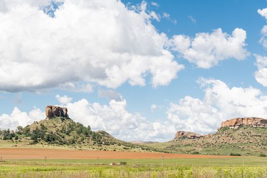 Farm landscape with typical sandstone hills between Ficksburg and Fouriesburg in the Free State Province of South Africa