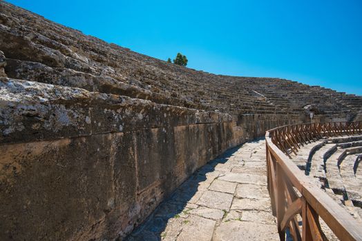 Roman amphitheatre in the ruins of Hierapolis, in Pamukkale, near modern turkey city Denizli, Turkey.