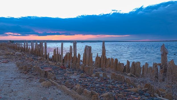 Sunset on the salty estuary Kuyalnik,  dead lake near Odessa, Ukraine