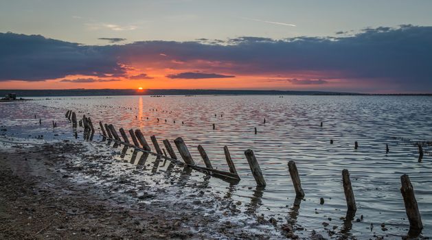 Sunset on the salty estuary Kuyalnik,  dead lake near Odessa, Ukraine