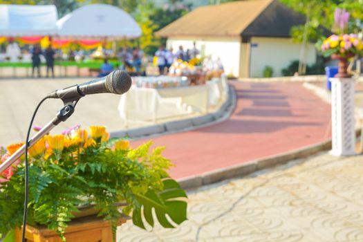 Close up of Microphone over the Podium in Meeting , Wedding Outdoor Event as Professional Communication Speech in Public or Press Conference concept
