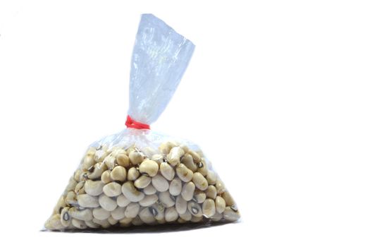 Black Eyed Beans in bag on isloated white background.