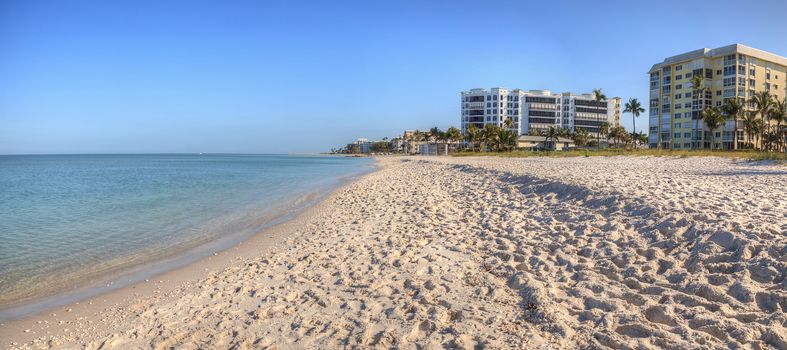 Clear blue sky over Lowdermilk Beach in Naples, Florida