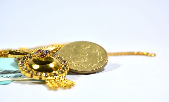 New indian 50 Rupees with jewellery on isolated background.