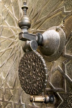 golden knocker on a door Morocco