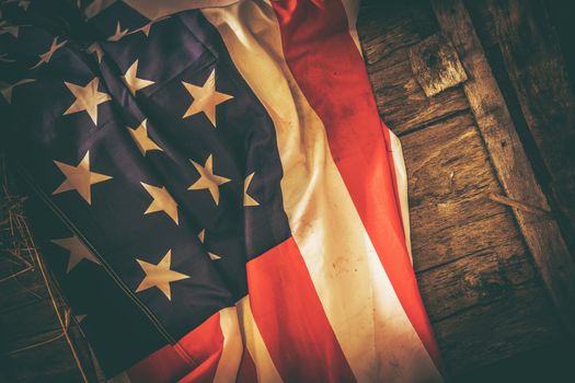 American Flag on the Reclaimed Wood Crate Closeup Photo. United States of America Country Vintage Theme.