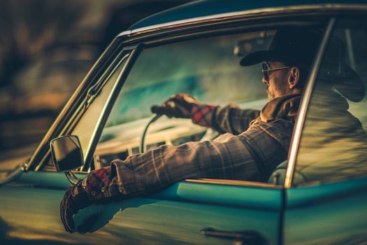 Cowboy Muscle Car Drive. Caucasian Men in His 30s Wearing Stylish Western Wear Taking Road Trip in His Classic Car. West American Ride in Style.