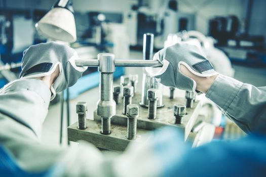 Worker Adjusting Lathe Machine. Metalworking Industry Theme.